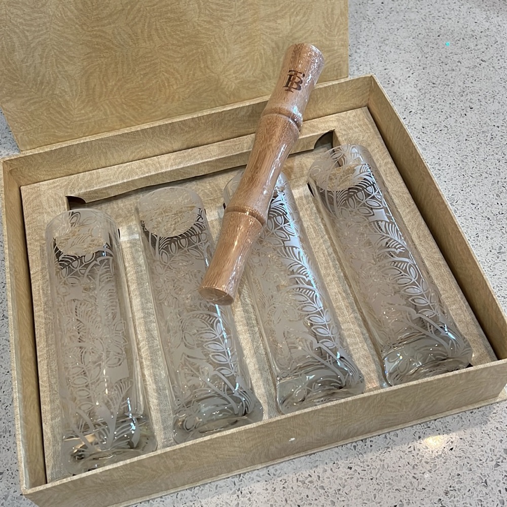 Beautiful Tommy Bahama etched glass mojito cocktail set with muddler.